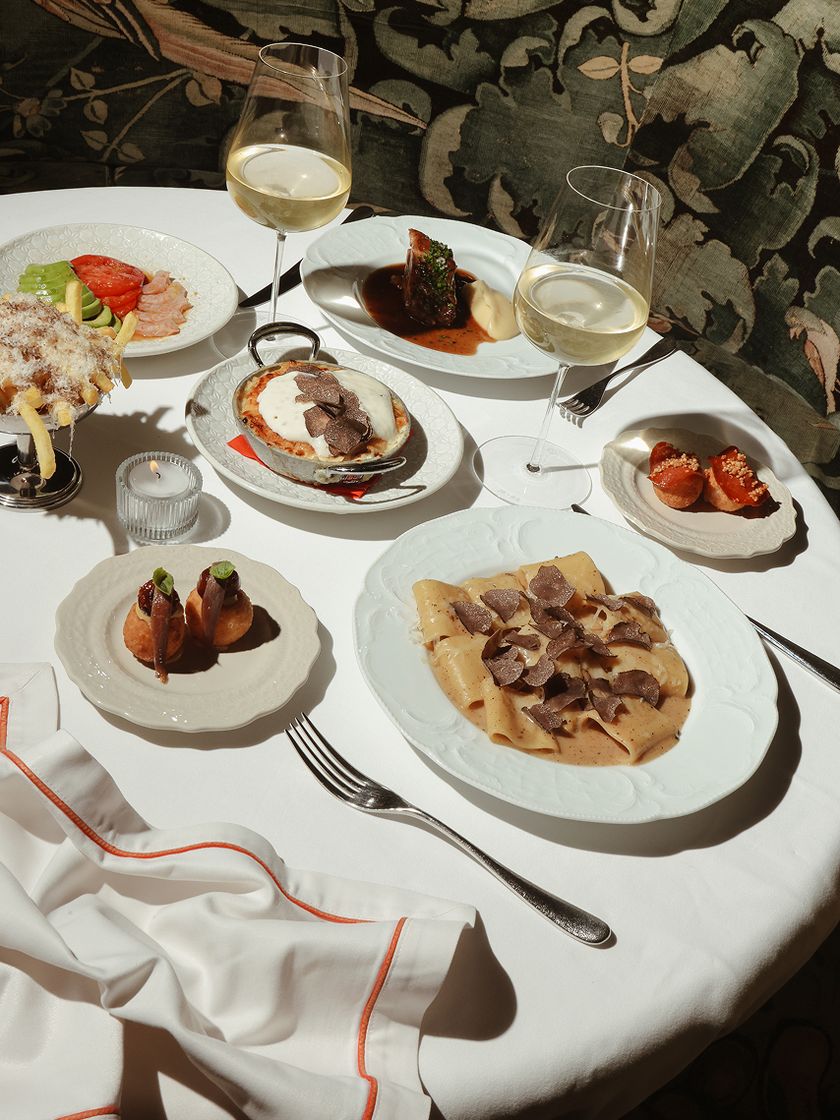 A group table at Bisou set with sharing plates.